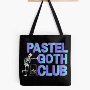 Black tote bag hanging on a wooden peg with large gradient text reading ‘Pastel Goth Club’ and a cute skeleton by a small flowered gravestone