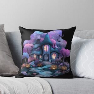 Square throw pillow featuring a pastel haunted cottage with glowing pumpkins and a starry night sky on a grey sofa