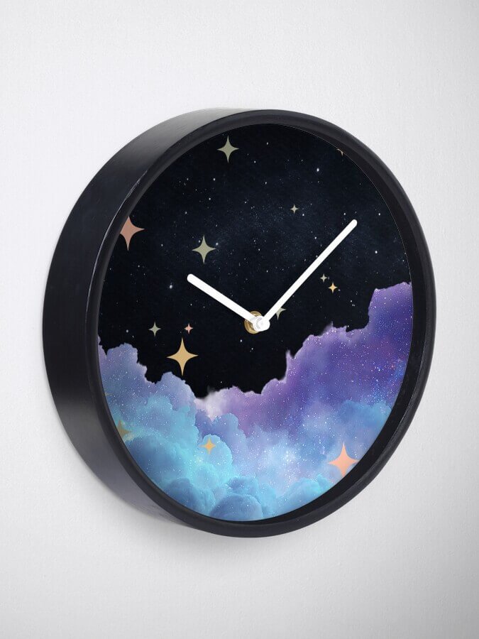 Close-up of the Midnight Cloud wall clock with a black frame, showing detailed pastel blue and purple clouds beneath a starry night sky.